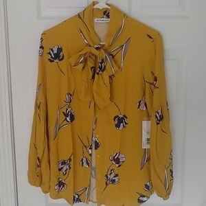 70s inspired yellow and purple blouse